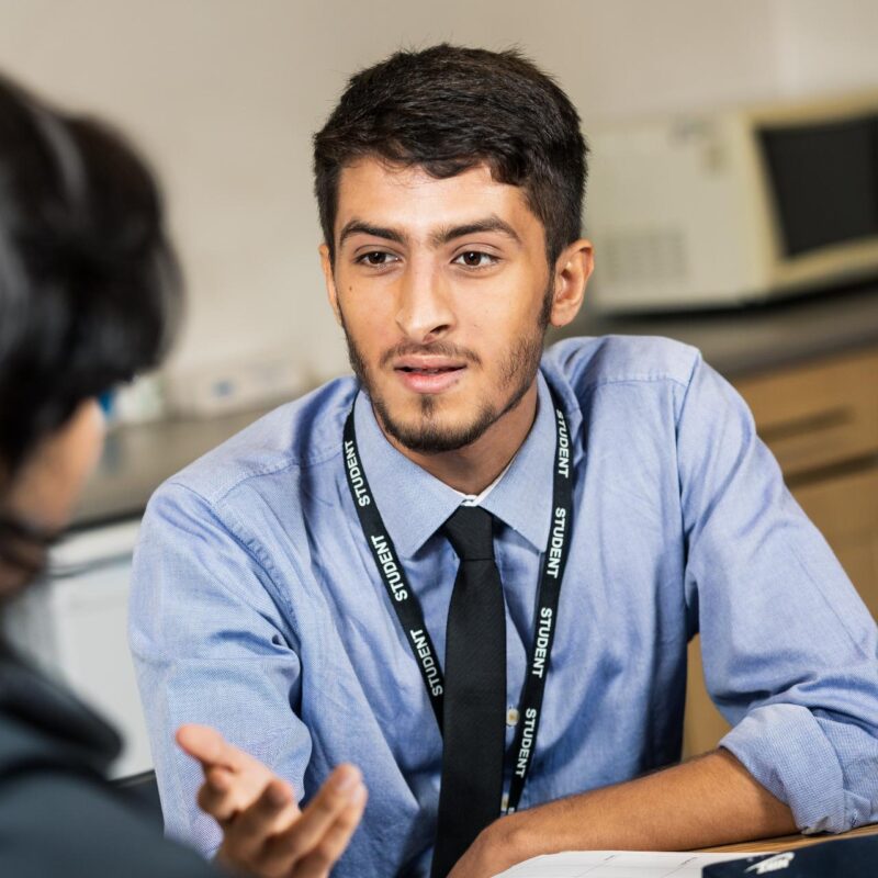 A boy talking in class