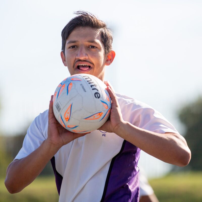 student playing netball