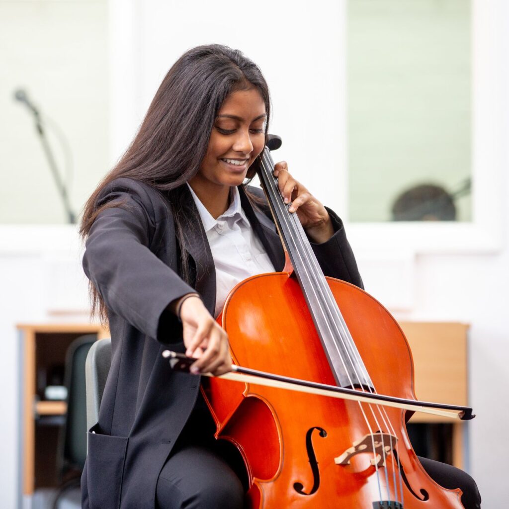 student playing instrument